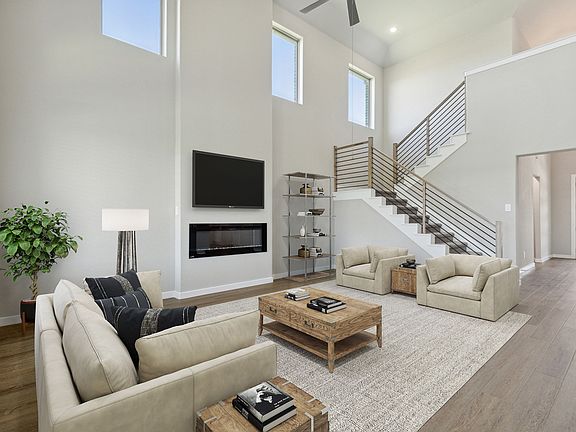 Living Room in the Henley home plan by Trophy Signature Homes - REPRESENTATIVE PHOTO