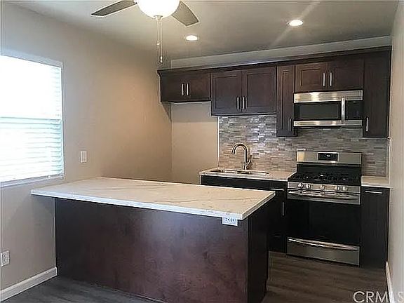 Now includes new stainless steel refrigerator