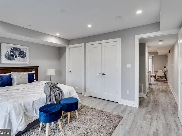 Bedroom with double closet and updated flooring