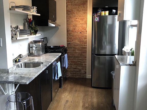 Fantastic all new granite kitchen--exposed brick