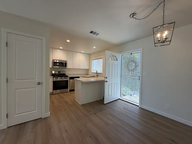 Kitchen with front door view