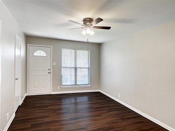 ANOTHER VIEW OF THE LIVING ROOM