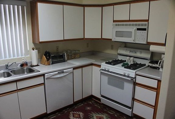 White with oak trim, GE appliances