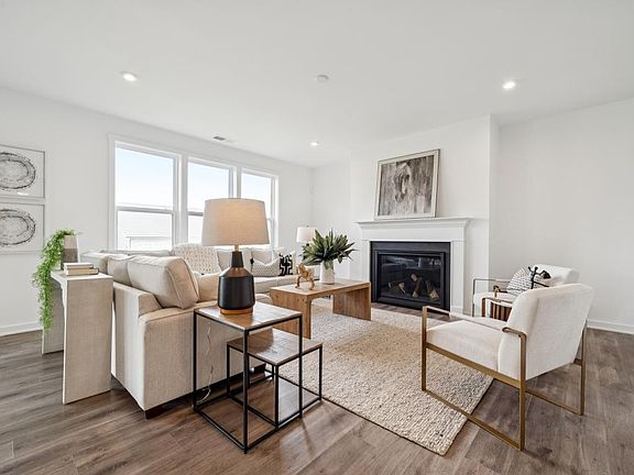 Open-concept great room with fireplace