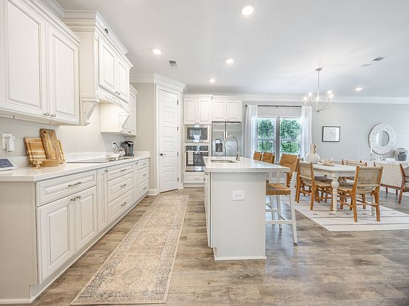 Kitchen in the Decatur floorplan at a Meritage Homes community in Gulfport, MS.