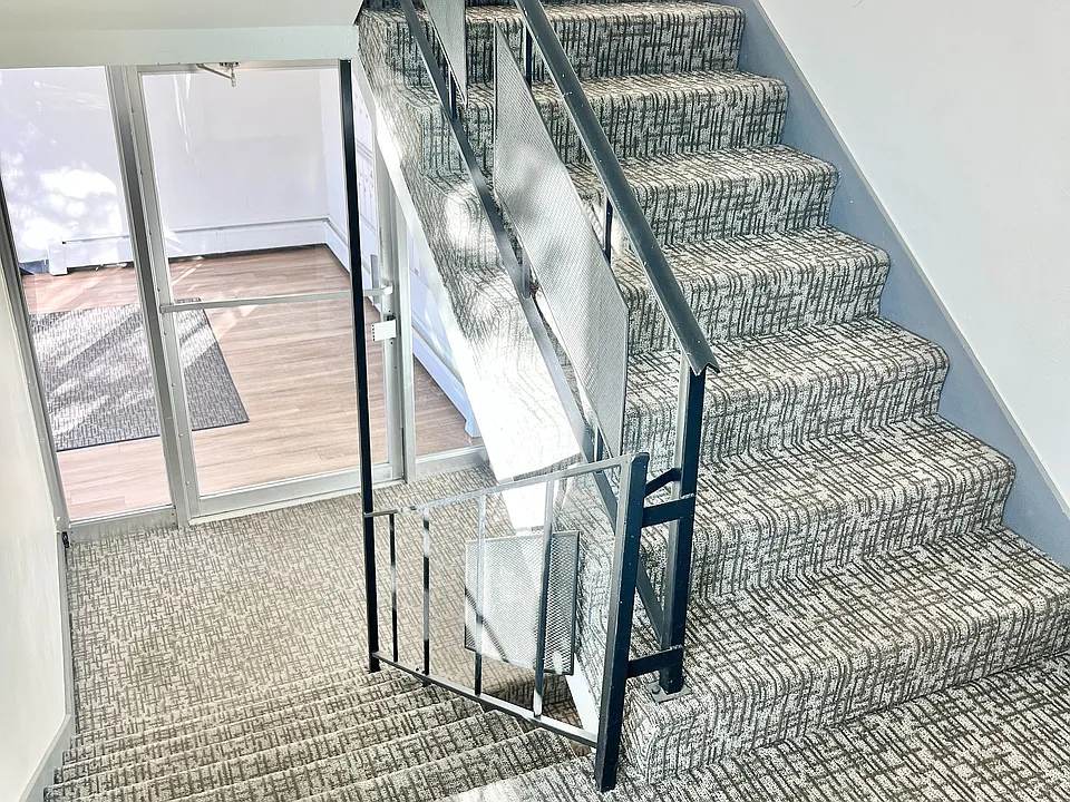 Experience modern elegance with this stylishly designed staircase, perfect for any contemporary home.