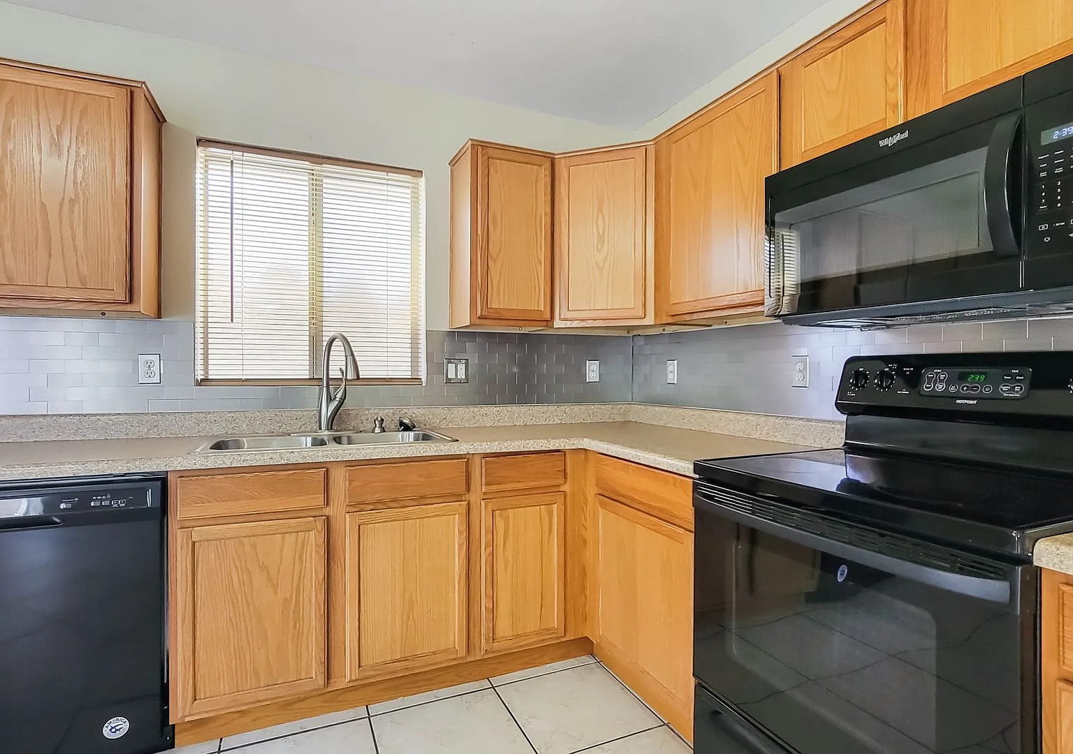 Hard to find a 4 bedroom at this price! No carpet! — Photo 4