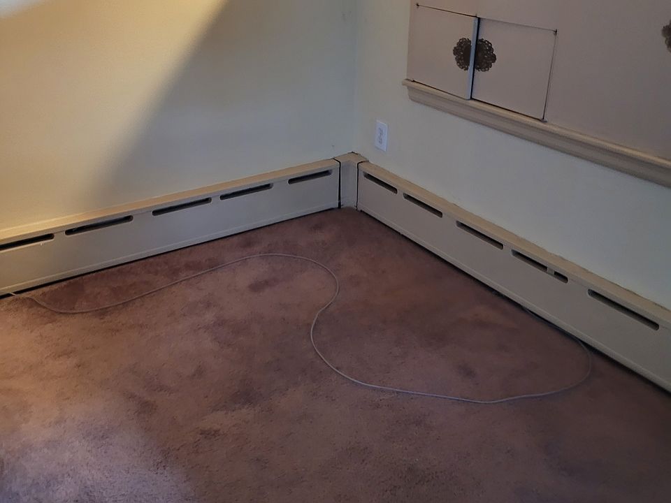 Livingroom space for home office computer. Storage to right and left. Opposite side has space to set up for developing videos, bright light.