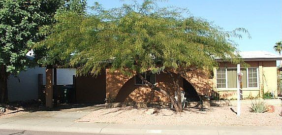 Wonderful home with beautiful mature shade trees.