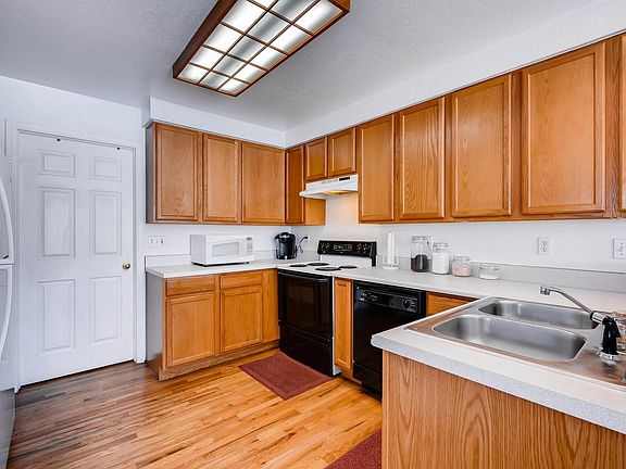 Kitchen and door to separate laundry room and garage