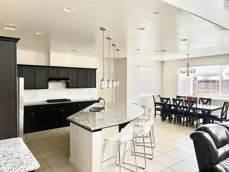7692 E Garland Ave — Photo 2