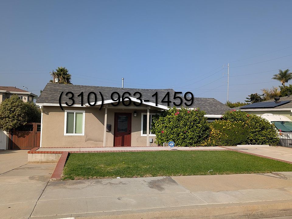 Front Yard, 2 driveways on right & Left hand side.