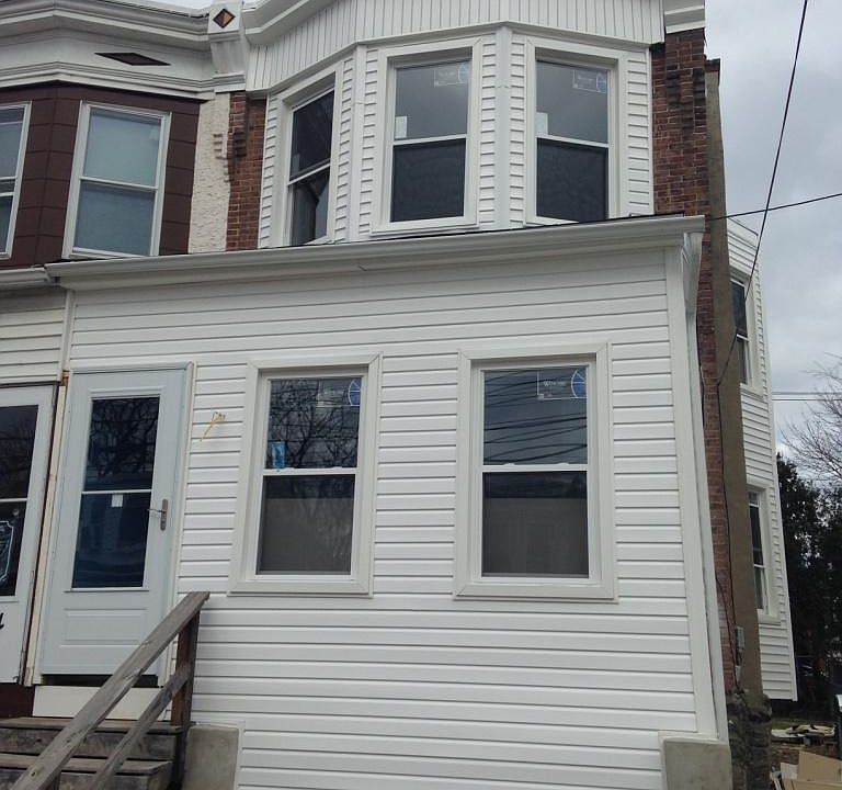 Front of House - New Siding & Windows