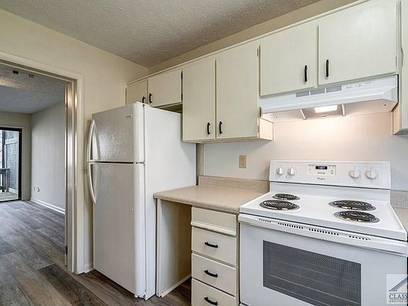 Kitchen leading to Dining Room/Living Room (Main Level)