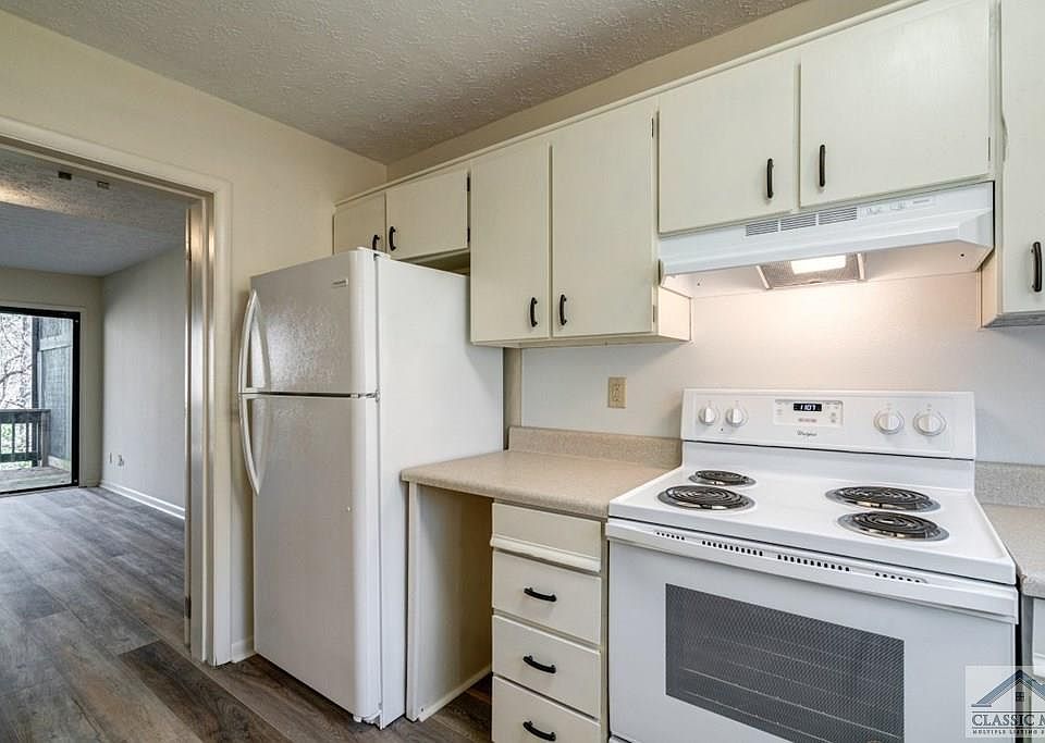 Kitchen leading to Dining Room/Living Room (Main Level)