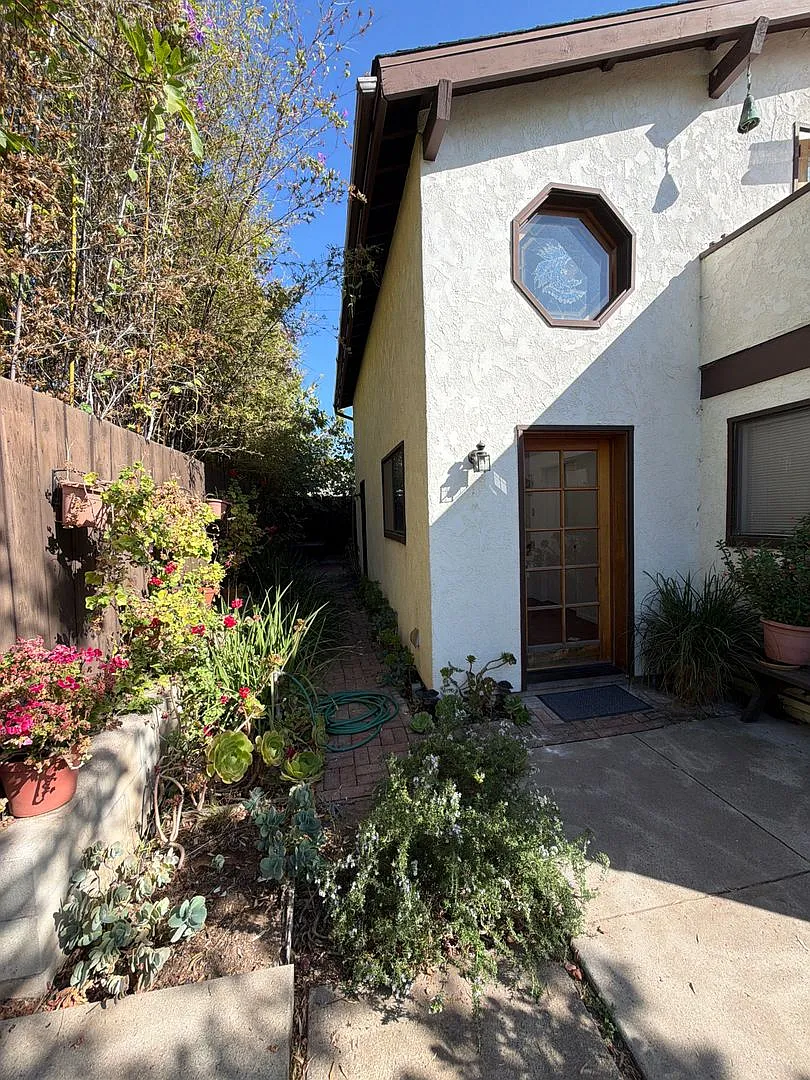 Spacious & Unique Home with Vaulted Ceilings, Private Balcony & Multiple Living Areas — Photo 4