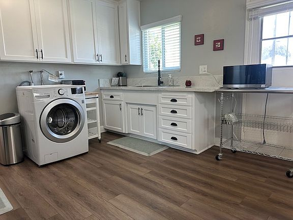 EVERYTHING (but the washer) you see is brand new. The large front load washer is 4 years old.