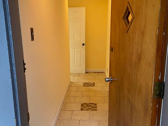 A newly painted hallway welcomes you home.