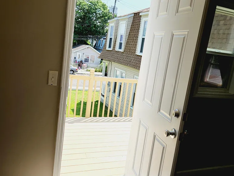 peeking out onto the front porch