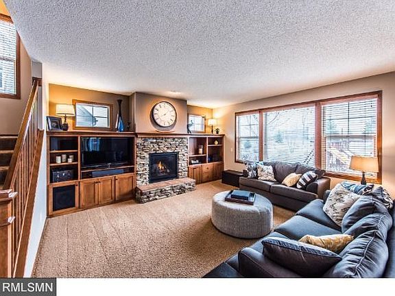 Gas fireplace in the main floor family room.  Stone surround with maple built-ins.