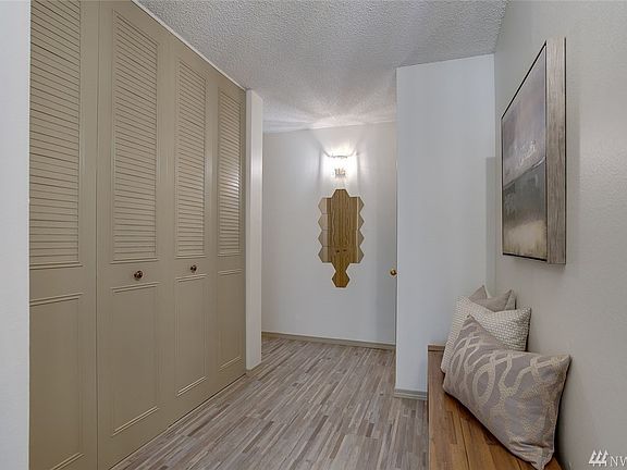 One level living offers two roomy bedrooms, two full bathrooms, utility room, one fireplace and so much more.