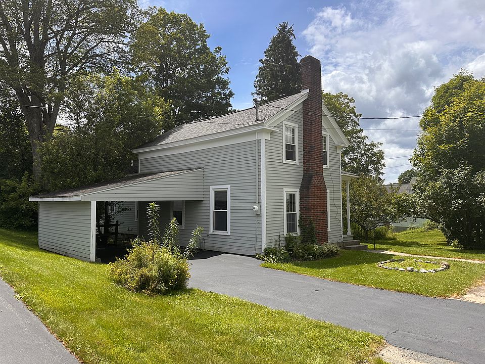 Side of house and car port