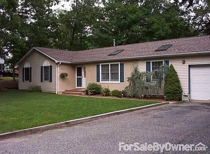 Front of house : Home sits on a quiet residential side street with minimal through traffic.