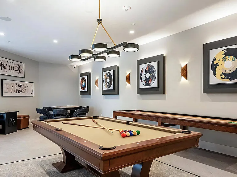 Game Room Featuring Pool Table, Shuffleboard, and Lounge Seating