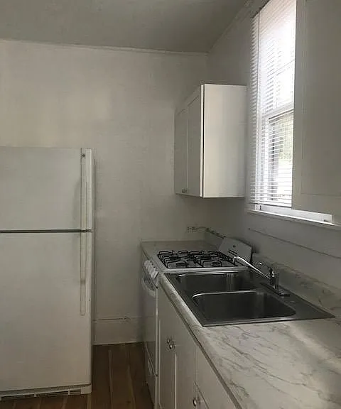 Gas Range, double sink, new cabinets