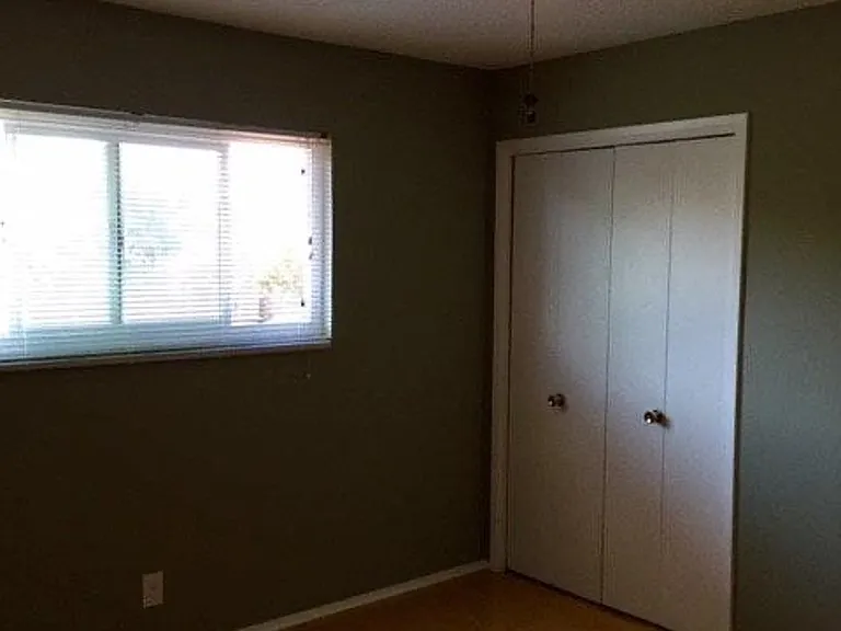 Bedroom #1 w/ Walk-in Closet.