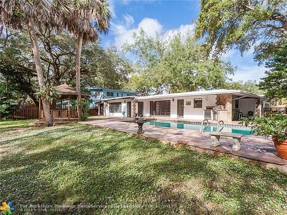 Cool Deck around salt water poolAdditional wood deck with Gazebo