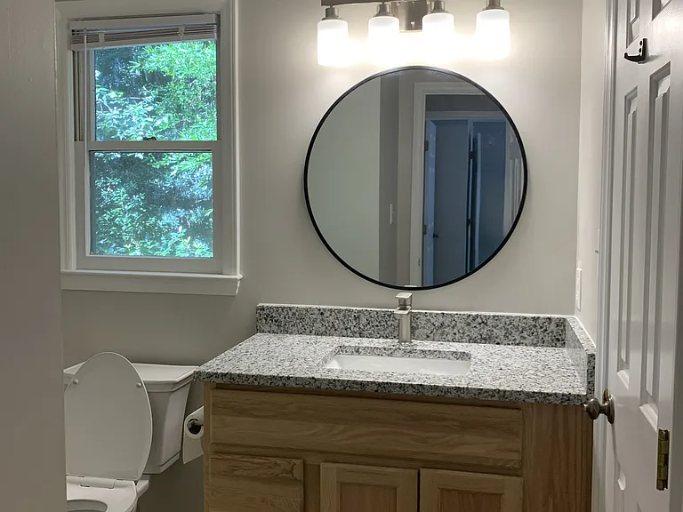 2nd full bathroom with access to 2nd bedroom and hallway, new toilet