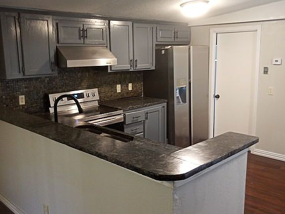 Granite top with garbage dis