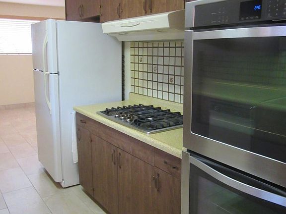 kitchen, facing eating area