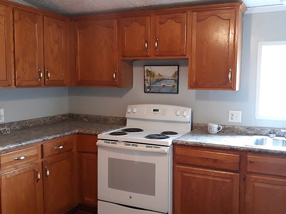Stove, refrigerator, washer, dryer included.