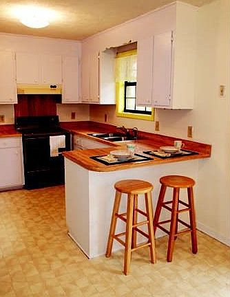 Eat-in kitchen with tons of cabinet space. Also room for Dining set.