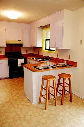 Eat-in kitchen with tons of cabinet space. Also room for Dining set.