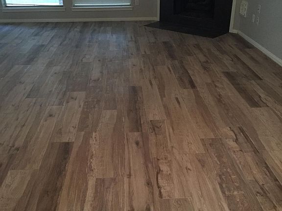 Wood-look tile in all main areas of the home