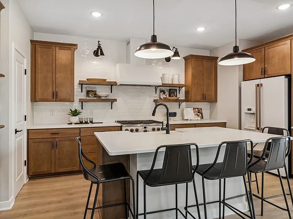 Kitchen with center island and pendant lighting