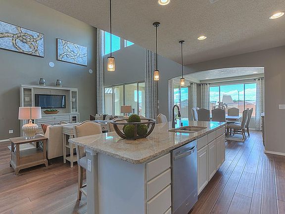 Soaring ceilings in the gathering room brightens the kitchen and cafe.