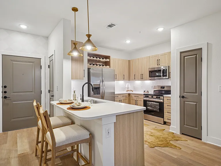 Kitchen with Quartz Countertop and Stainless Steel Appliances
