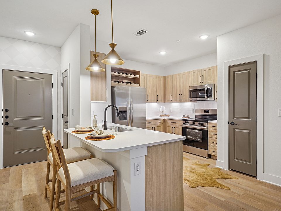 Kitchen with Quartz Countertop and Stainless Steel Appliances