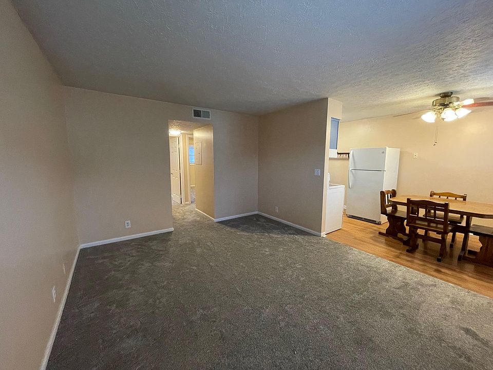 Living room and dining area (dining set not included).