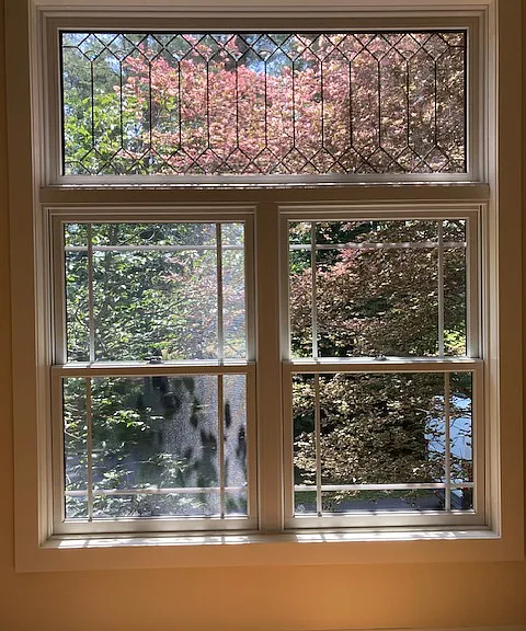 Large windows with art glass to enhance your view.
