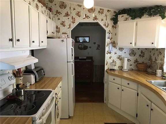 Galley Kitchen off Dining Area.  All appliances included
