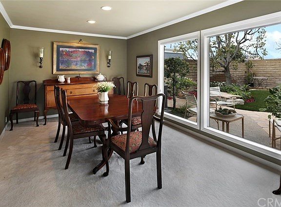Formal Dining Room opens to Living Room and Backyard