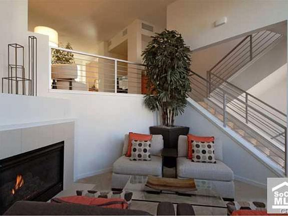 Home is UN-furnished. These photos are from the model. Please note the carpet will be replaced with luxury wood-look vinyl plank. There is laminate flooring in the kitchen and tile in the bathrooms.