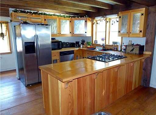 custom cabinets w punched tin inserts