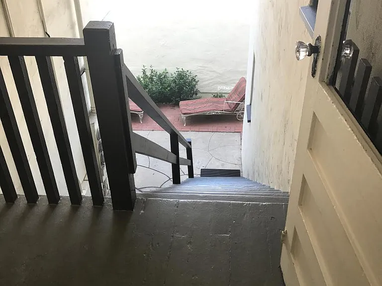 Back Entrance from patio & alley