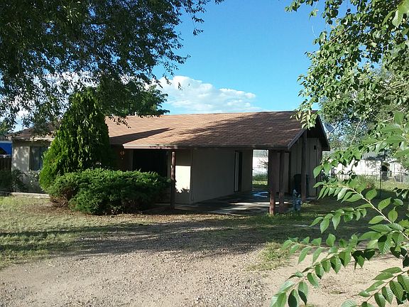 Carport on east of house.